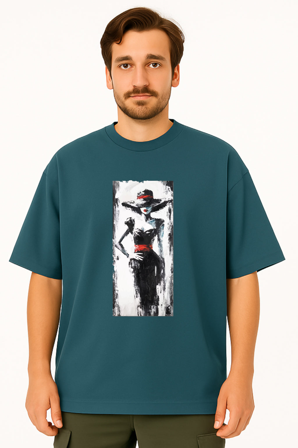 Man wearing a teal t-shirt with a graphic design of a woman in a hat and dress.