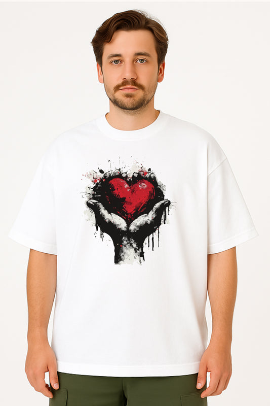 Man wearing a white t-shirt with a black and red heart design on a white background