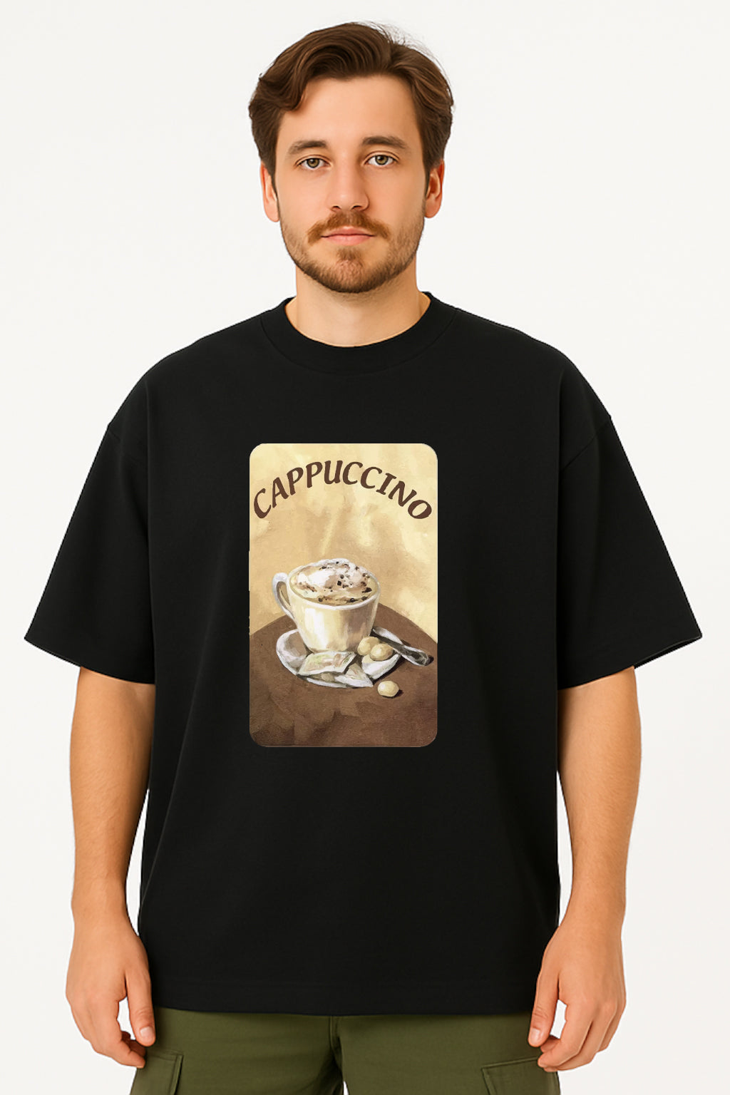 Person wearing a black t-shirt with a cappuccino graphic on a plain background