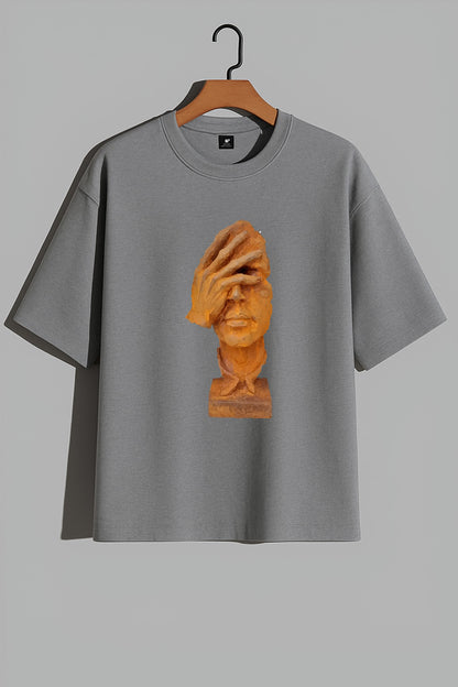 Premium Oversized T-Shirt with Abstract Face and Hand Sculpture Graphic