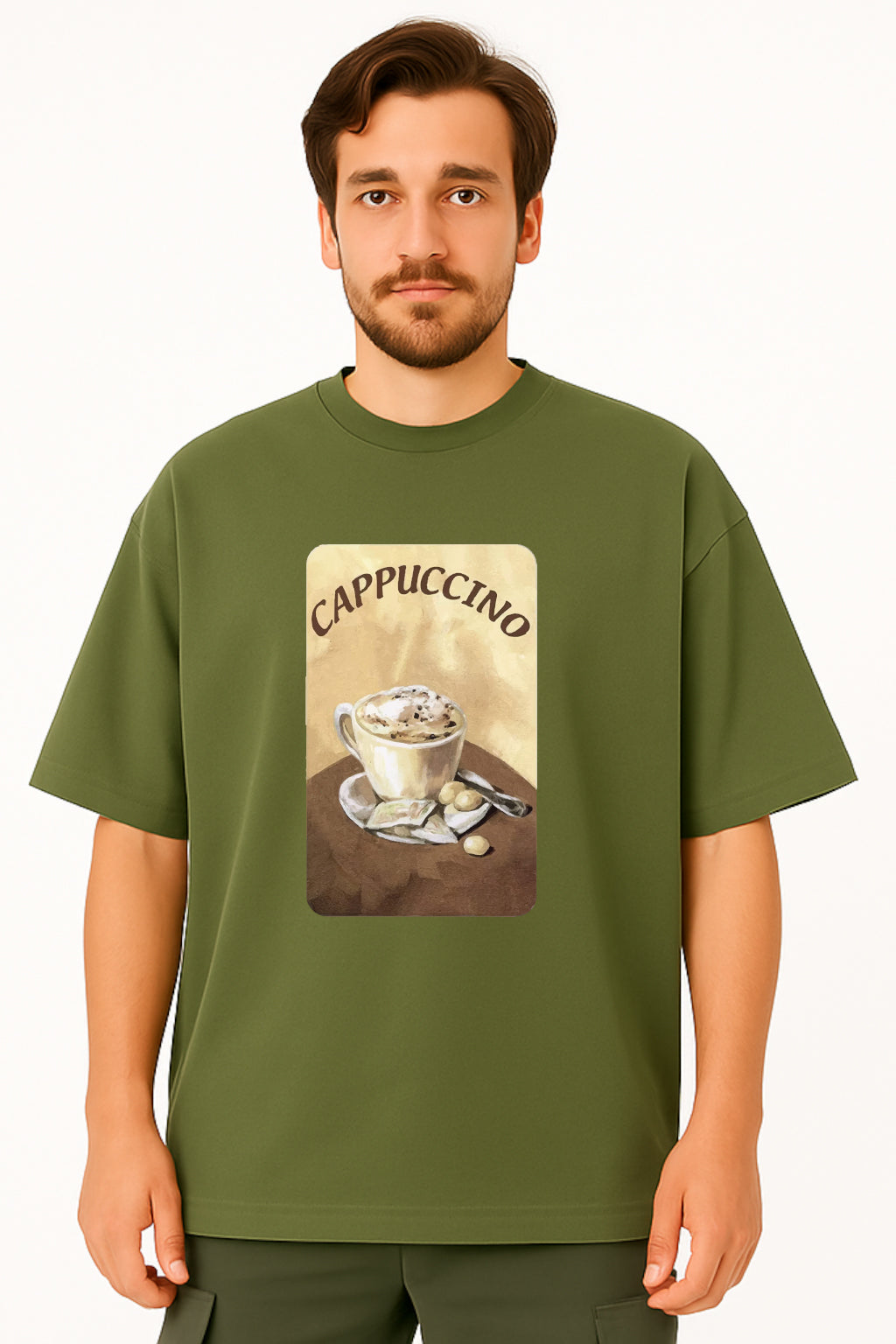 Man wearing a green t-shirt with a cappuccino graphic design on a white background