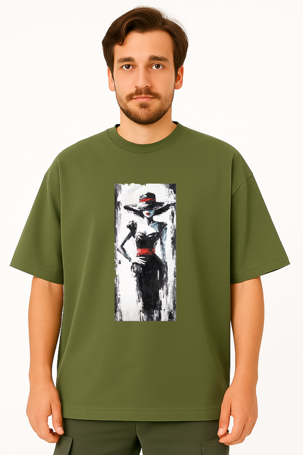 Man wearing a green t-shirt with a graphic design of a woman in a hat on a white background