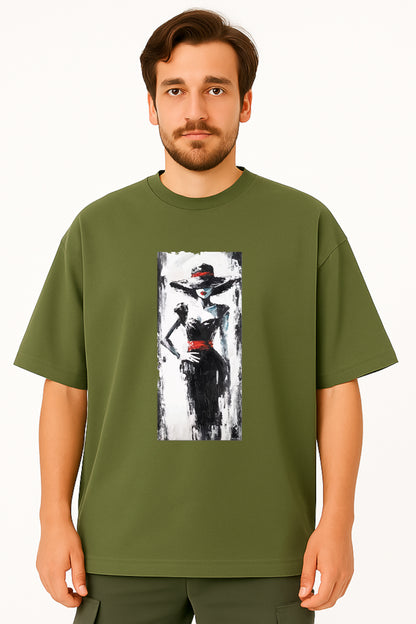 Man wearing a green t-shirt with a graphic design of a woman in a hat on a white background
