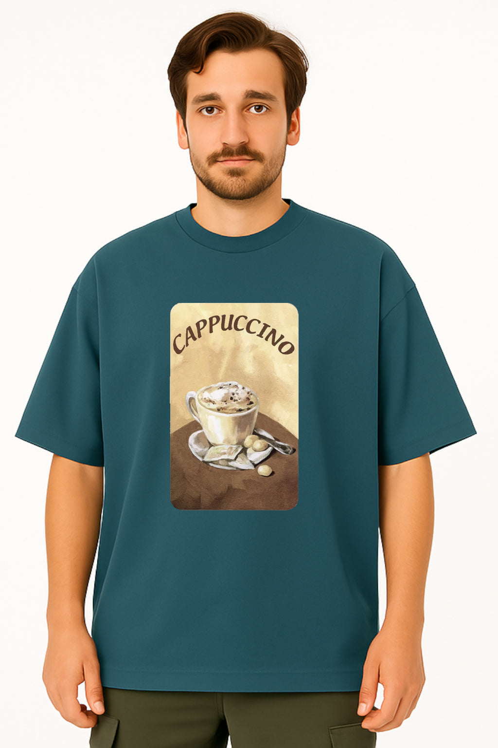 Man wearing a teal t-shirt with a cappuccino graphic on a white background