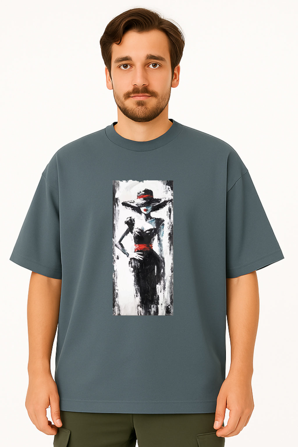 Man wearing a gray t-shirt with a graphic design of a woman in a hat and dress.