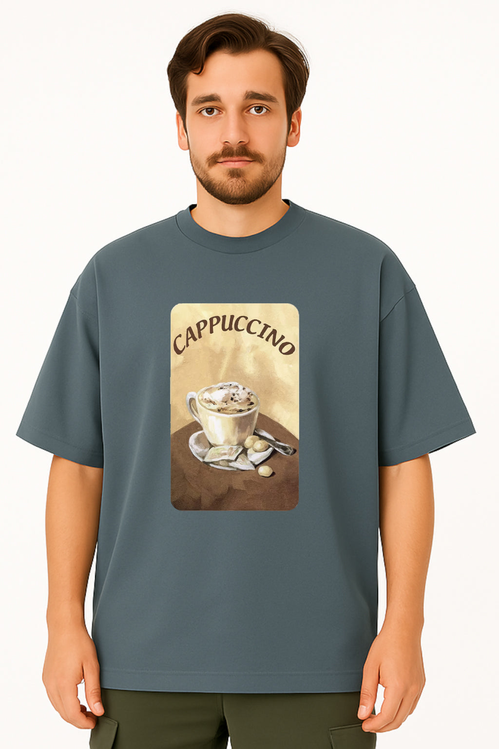 Man wearing a blue t-shirt with a cappuccino graphic and text.